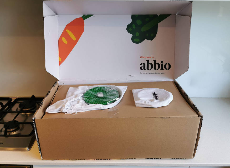 open box of abbio cookware