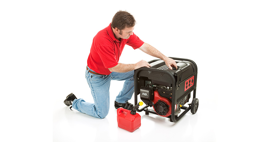 man filling generator with fuel