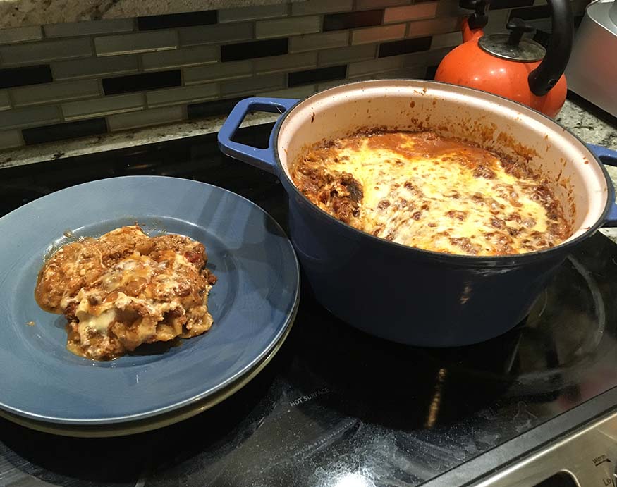 A Misen Dutch Oven with filled with lasagna