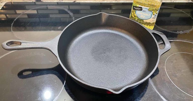 a clean and rust-free cast iron skillet on the stove