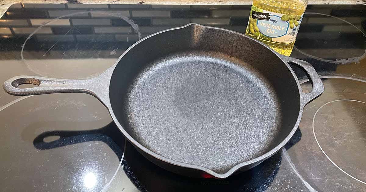 a clean and rust-free cast iron skillet on the stove