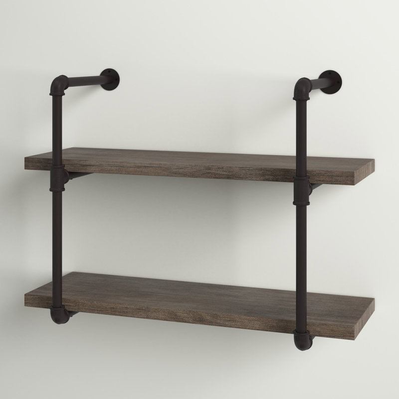Wall-mounted shelf with two wooden planks and black metal pipes for support, against a light-colored background.