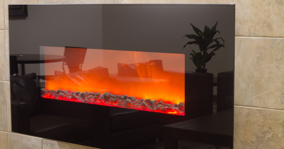 A wall-mounted electric fireplace in the living room
