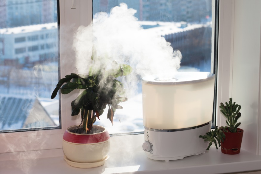 a humidifier releasing steam to the living room