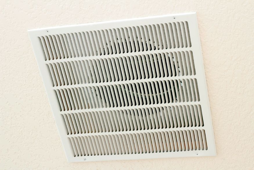 an air return vent on the ceiling