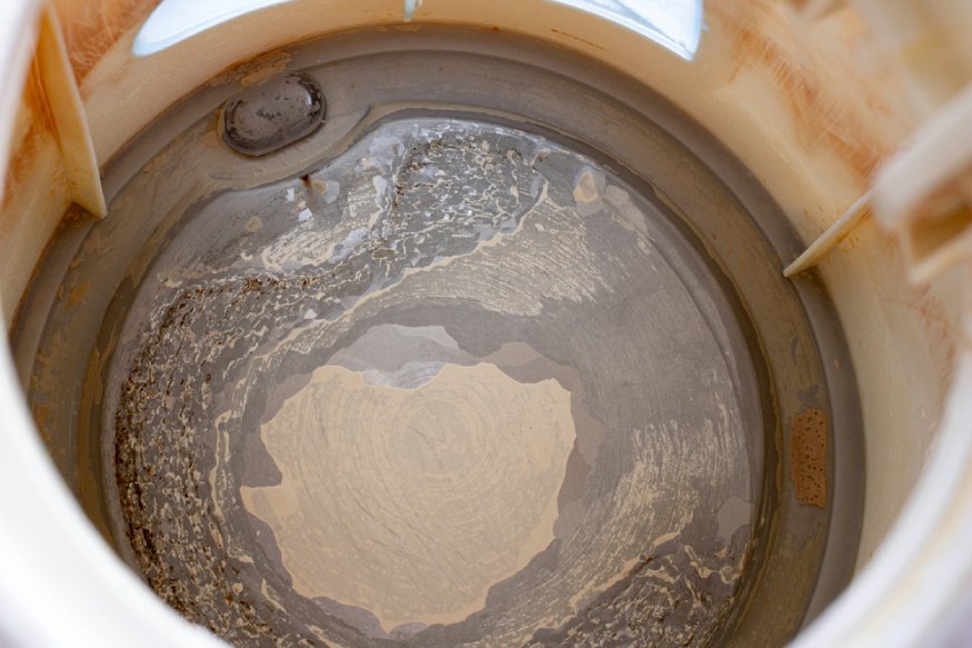 limescale build-up on a humidifier’s water tank
