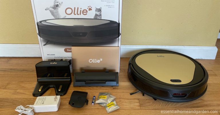 Trifo Ollie Pet Edition robotic vacuum and its packaging and inclusions on the floor