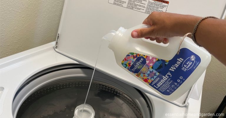 woman pouring Truly Free non-toxic liquid laundry detergent into the washer