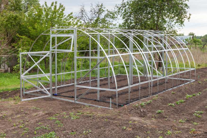 photo of a greenhouse with steel frame