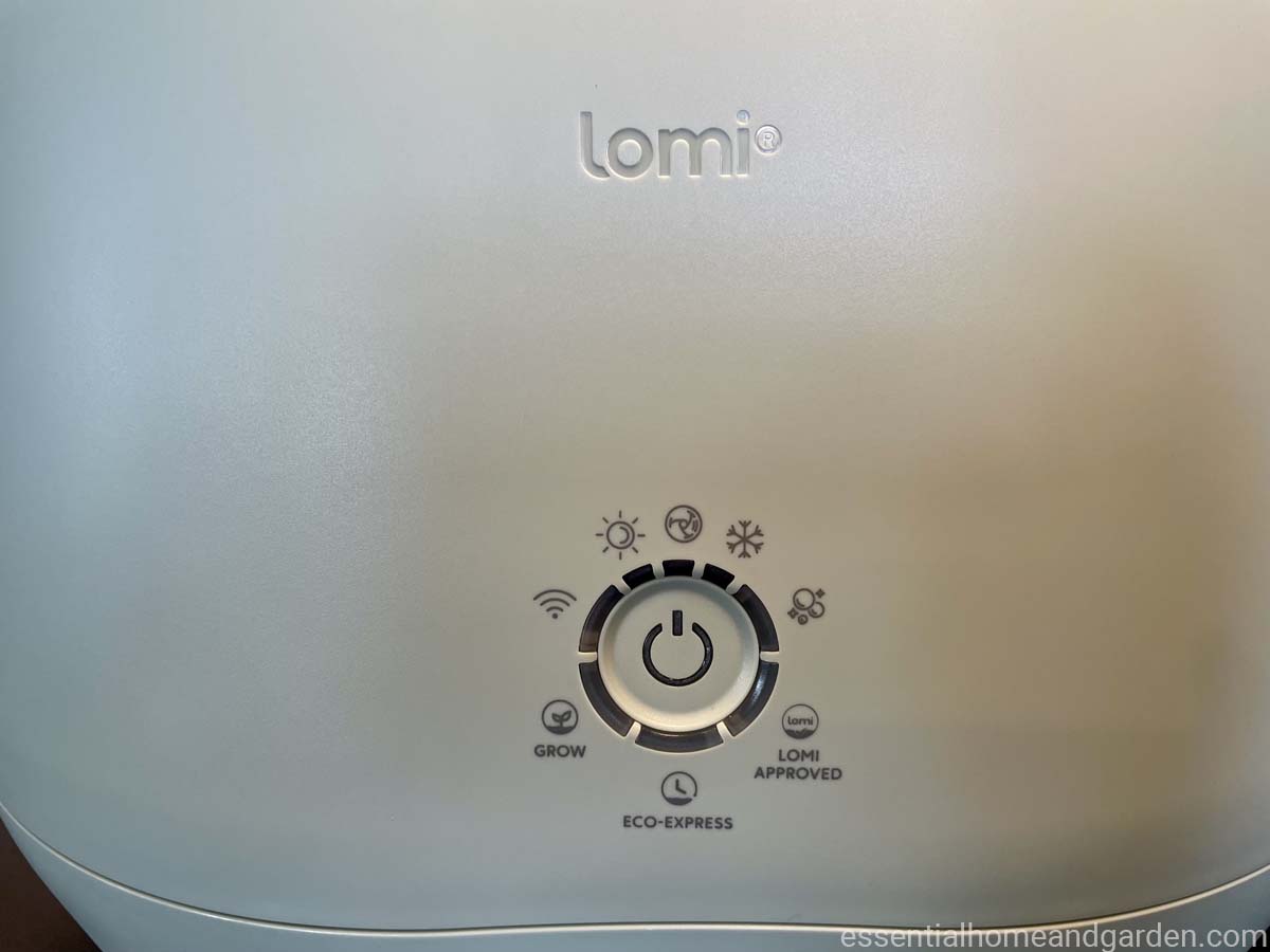 A close up of the control panel of a lomi bloom countertop composter