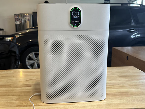 a morento smart air purifier in a garage
